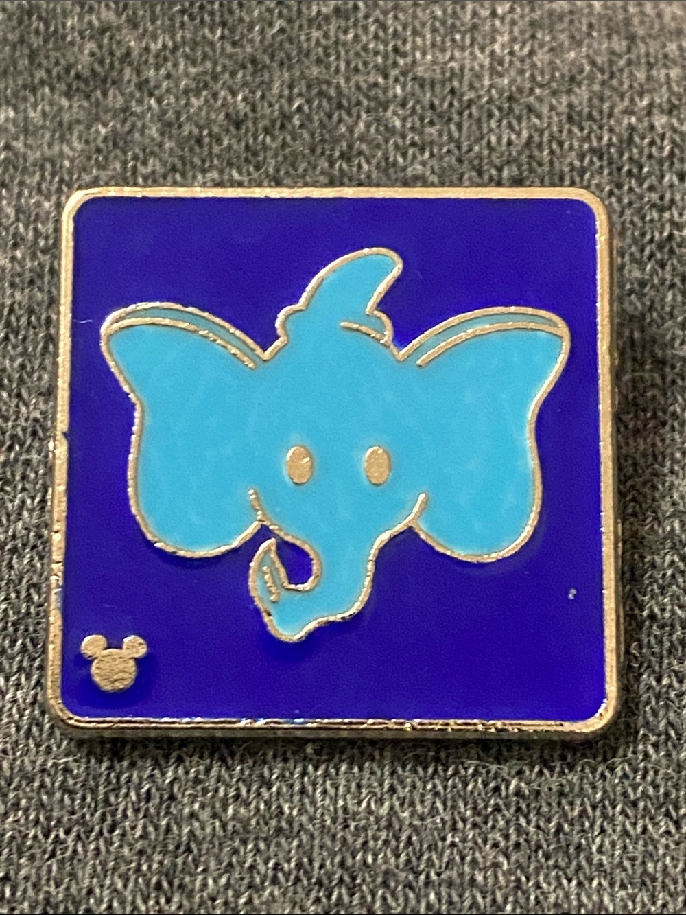 Disney Pin Dumbo the Flying Elephant, Light Blue Pin Royal Blue Background